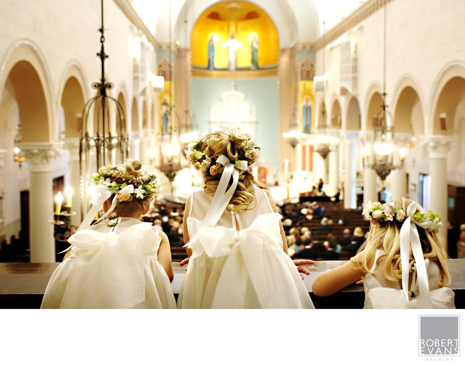 Flower Girls Voyeurs Flower girls watching a ceremony in a sunlit church
