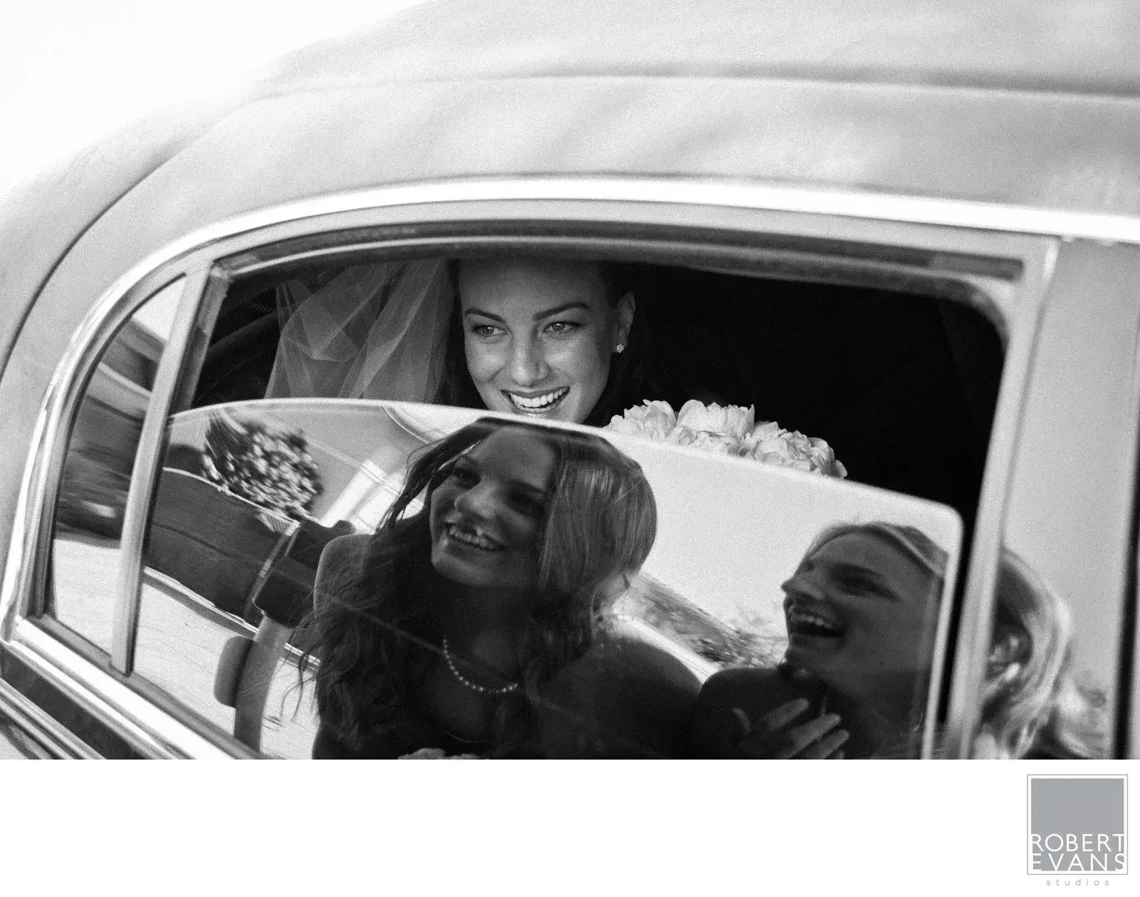 A Brides View A bride and her dog looking out of a car window